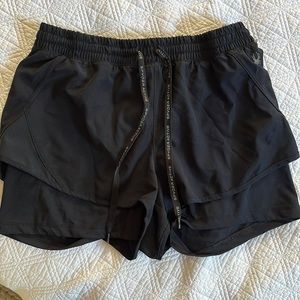 Gently used black running/workout shorts with liner